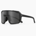 Lunettes vélo solaires noires, verre fumé, vue de trois-quarts